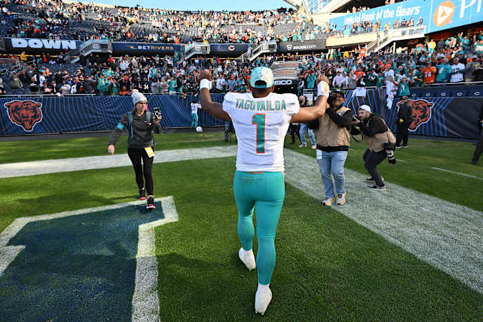 Nov 6, 2022; Chicago, Illinois, USA; Miami Dolphins quarterback Tua Tagovailoa (1) heads to the locker room after defeating the Chicago Bears 35-32 at Soldier Field. Mandatory Credit: Jamie Sabau-USA TODAY Sports